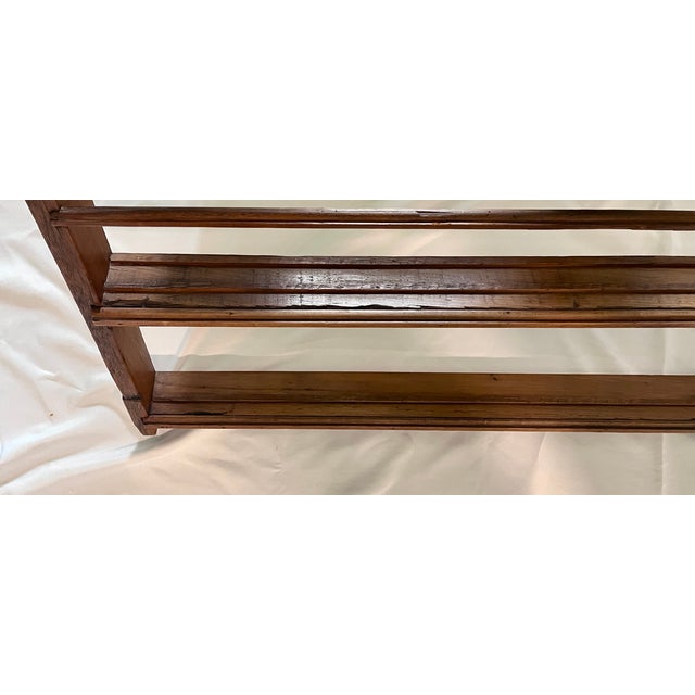 English stained pine plate rack. Two shelves with half round molding to display your plate collection. Beautiful tiered...
