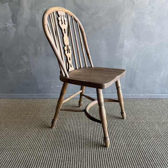 Our Spindle Back Chair is a refined take on a timeless classic. Crafted from solid white oak, this chair highlights the...