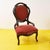Discover the timeless appeal of these solid wood armchairs, finished with red velvet upholstery. Each chair features...