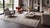 Elevate your interior with this exceptional contemporary hand-Knotted wool flatweave rug, masterfully crafted in the...
