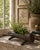 A wonderfully tactile mid-20th-century planter hand cast in iron to resemble a hollow section of fallen timber. The...