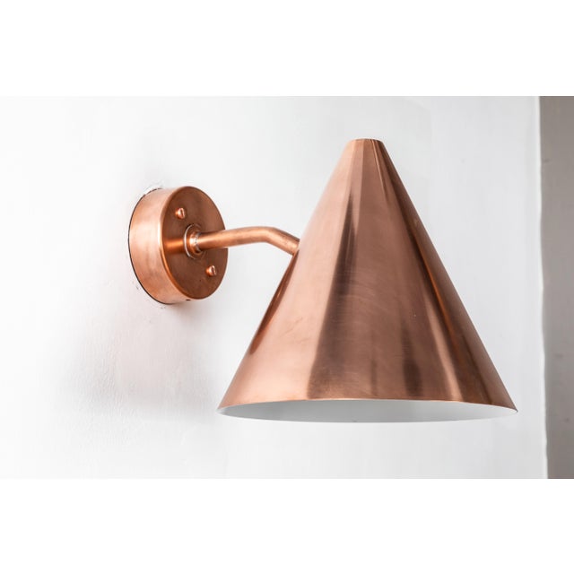 Hans-Agne Jakobsson 'Tratten' polished copper outdoor sconce. An exclusive made for U.S. and UL listed authorized re-...