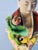 Vintage Quan Yin Chinese Fine Porcelain Hand Painted Sculpture. Representing Divinity. Quan Yin is holding a Lotus Flower....