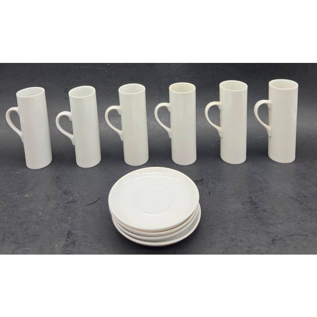 Offered is a set of 6 Lagardo Tackett white porcelain espresso or demitasse cups made by Schmid in Japan, circa. the...