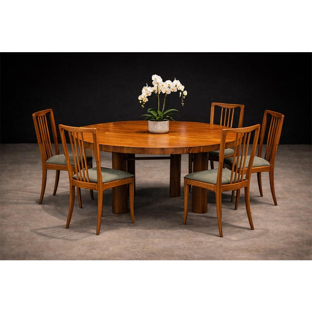 A sculptural set of five dining chairs designed by Giuseppe Scapinelli in the 1950s. Each chair is crafted in solid...