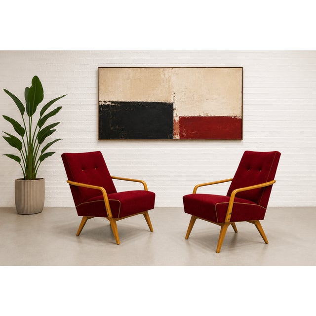 A striking pair of original lounge chairs, designed by Jaroslav Smidek, Made in Czechoslavakia, c. 1960s. These sculptural...