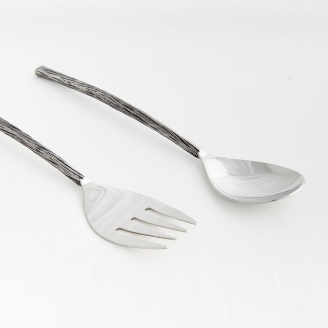 With silver making a comeback, these salad servers are right on trend. They add a touch of nature with their branchlike...