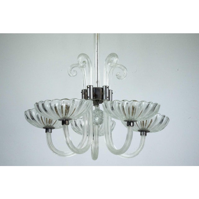 An exceptional and rare Art Deco five-arm chandelier attributed to Seguso, crafted in Italy in the 1940s. This elegant...