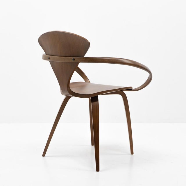 Cherner Armchair, natural walnut veneer, reedition from the 2000s based on Norman Cherner’s original 1958 design. Molded...