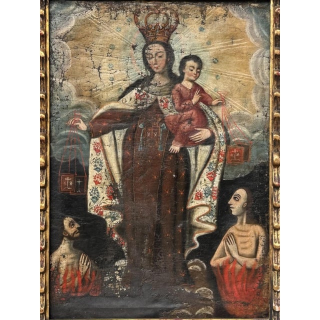 18th century Spanish oil on canvas of Our Lady of Mount Carmel. The scene depicts Mary wearing a brown habit and a flowery...