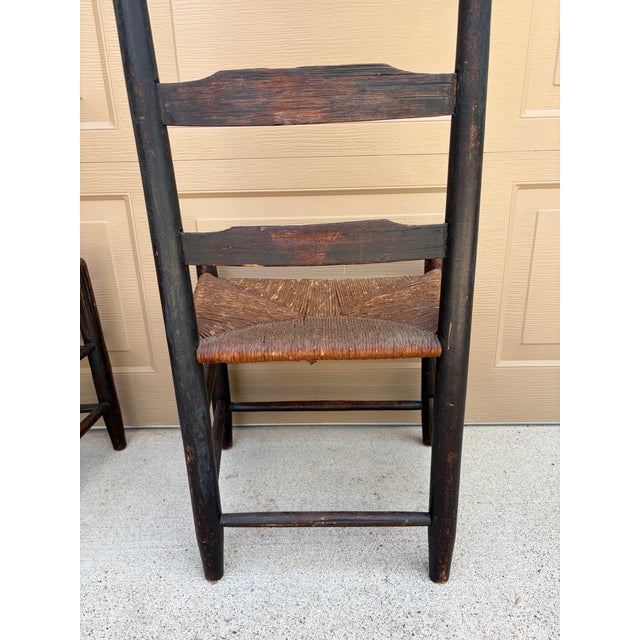 Pair of Antique Black Painted Shaker Ladder Back Chairs With Rush Seats For Sale - Image 17 of 18