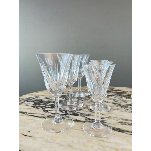 A superb crystal glassware set by Saint Louis, Cerdagne pattern, renowned for its elegant designs and refined lines. The...