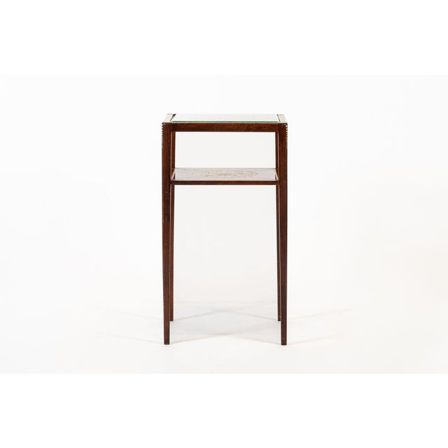 This antique French Art Nouveau small mahogany wood and glass decorative side or end table is circa 1900-1910. This...