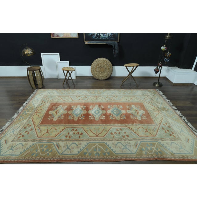 Vintage Turkish Hand-Knotted vintage rug is a semi-antique vintage area rug.'70s Eastern region of Turkey's unique rug is...