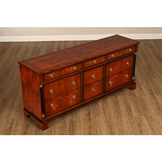 High Quality Triple Dresser with Banded Top and Assortment of Dovetailed Drawers Flanked by Ebonized Columns