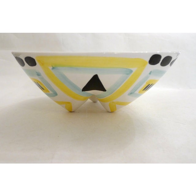 Mid-century tripod dish, fruit bowl, centerpiece, large trinket dish… Rounded triangular body resting on three small...