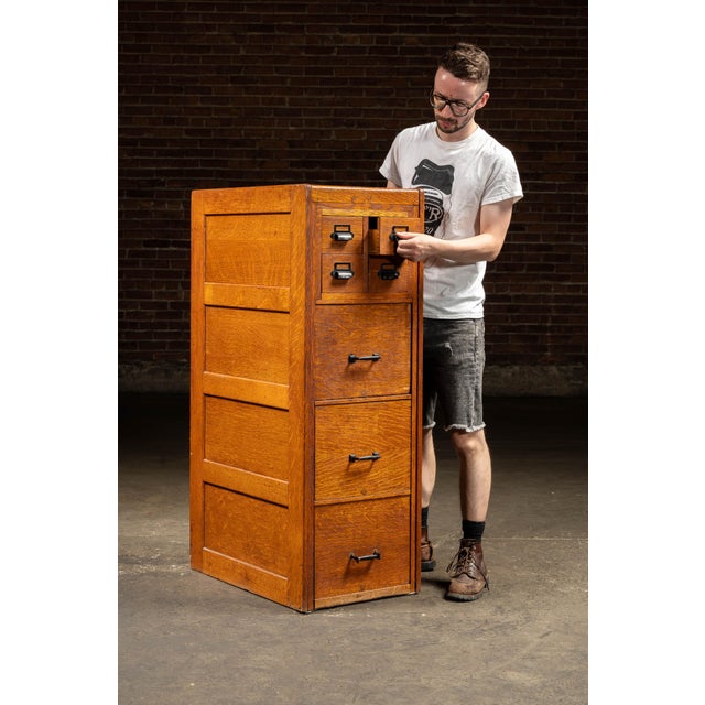c. 1920s; (likely) Library Bureau SoleMakers - Boston, MA Quartersawn oak combination cabinet featuring four file drawers...
