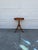 We have a gorgeous vintage Federal Revival pedestal side table for sale. It features a beautifully figured wood top,...