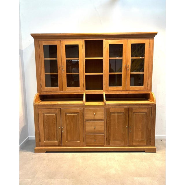 Impressive teak cabinet dresser in a timeless and functional design. This large two-part piece combines generous closed...