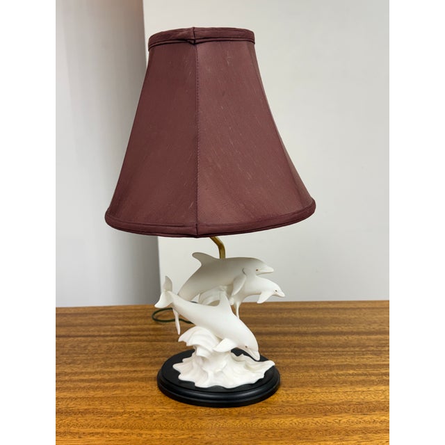 Design Plus Gallery presents Dance of the Dolphins Table Lamp from Lenox. The sculpture has been transformed into a...