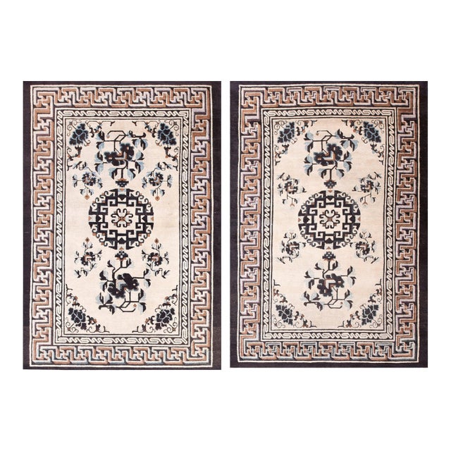 Pair Small White-Cream Background Color and Brown Border With Simplistic Geometric Pattern Antique Chinese Mongolian Rug For Sale