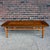 This is a gorgeous Lane coffee table, style number 1921. It features a nice walnut frame with set of 18 Burlwood squares...