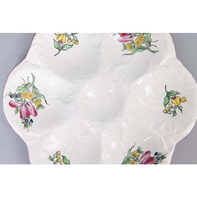 A gorgeous antique French Majolica floral porcelain oyster plate by Keller & Guérin made in Luneville, France, circa 1890....