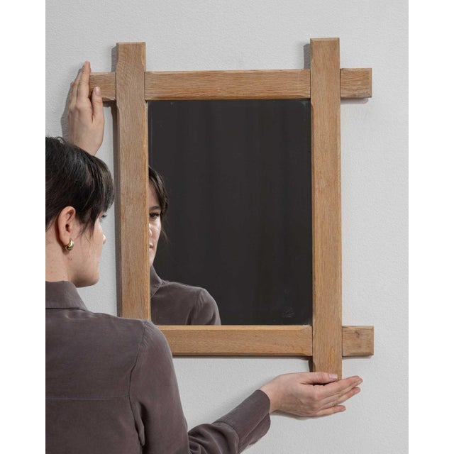 This mirror frame carries genuine presence, its natural bleached oak, chunky cross joinery immediately setting the tone...