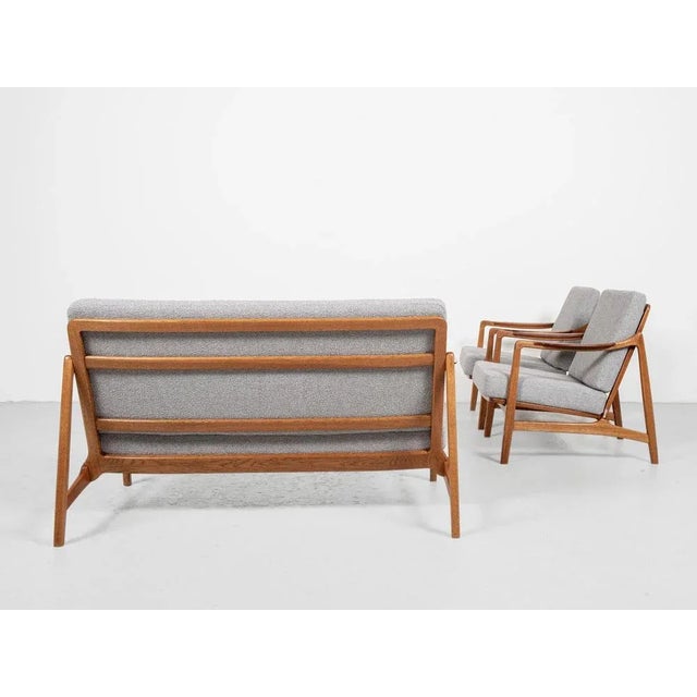 This original set of 2 easy chairs and a 2-seater sofa is designed by Tove & Edvard Kindt-Larsen and manufactured by...