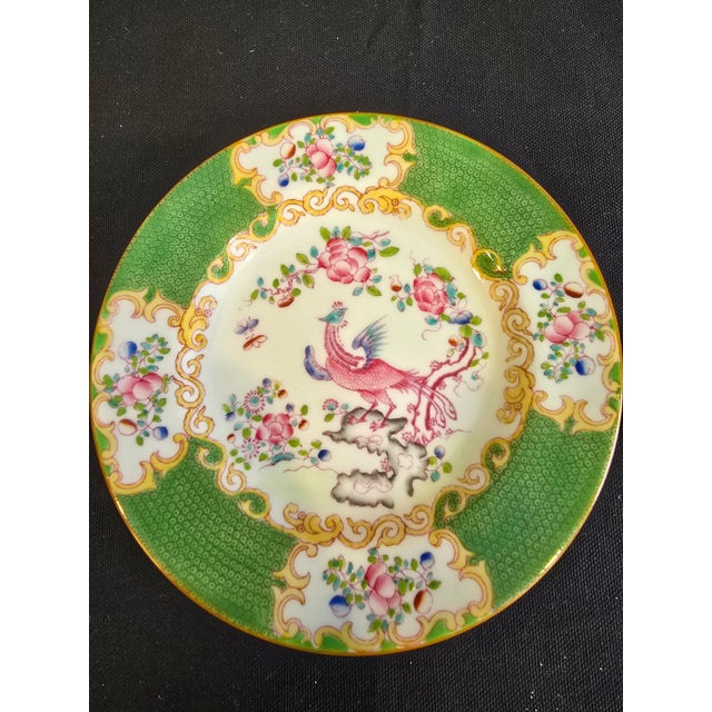 Beautiful Minton Green Cockatrice fine bone china featuring colorful birds and florals with a soft green border and brown...