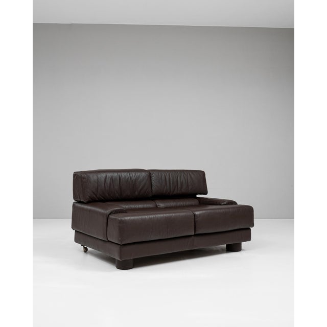 his 1970s Brazilian leather sofa by Percival Lafer exemplifies the designer's innovative approach to modern furniture....