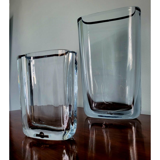 A truly monumental and sculptural pair of mid-century modern art glass vases designed and produced by the prestigious...