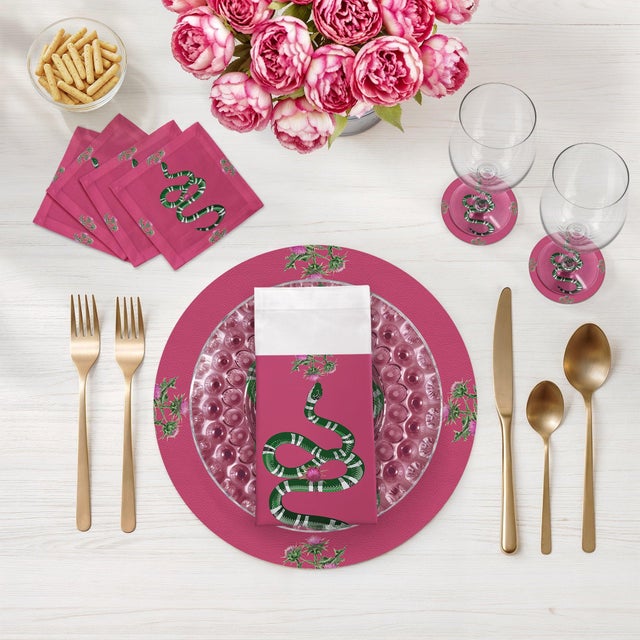 Infuse your dining space with classical elegance and whimsy through the Thistle And Snake Vegan Leather Round Pebble...