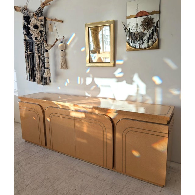 1970s Italian birch wood veneer & brass sideboard, attributed to Turri (no labels). Four curved edge doors with shelving &...