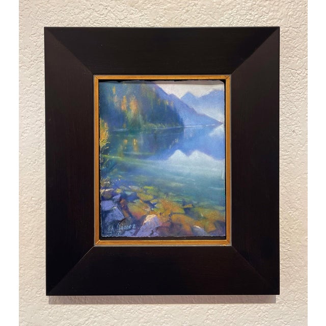 This pastel artwork captures the serene beauty of Lake Crescent, depicting the tranquil waters reflecting the surrounding...