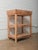 This handcrafted Indian wooden shelving unit features a timeless, utilitarian form rooted in traditional workshop...