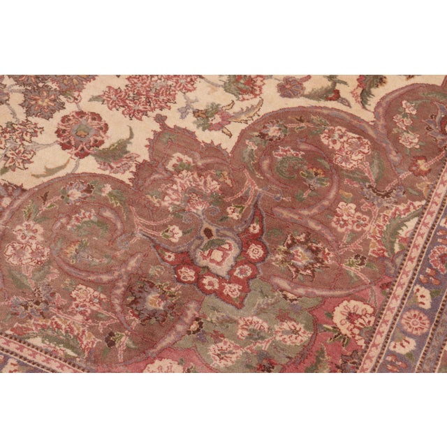 Designed with mesmerizing intricacy and gorgeous color palette, this hand-knotted masterpiece demonstrates the beauty and...