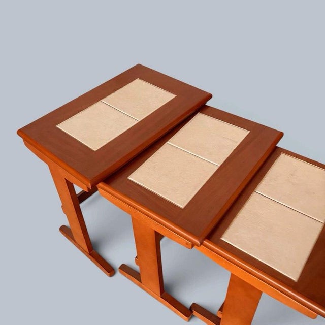 A particularly attractive example of the classic tiled nesting table, with the neutral cream tiles making these easy to...
