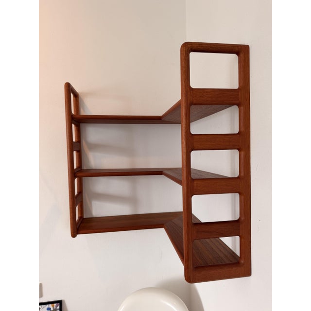 Rare Scandinavian corner wall shelf by Dyrlund, made in Denmark in the 1960s/1970s. Original manufacturer's mark "Made in...