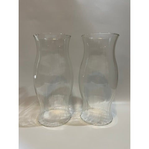 A matching pair of vintage transparent ribbed glass hourglass form candle hurricane shades.