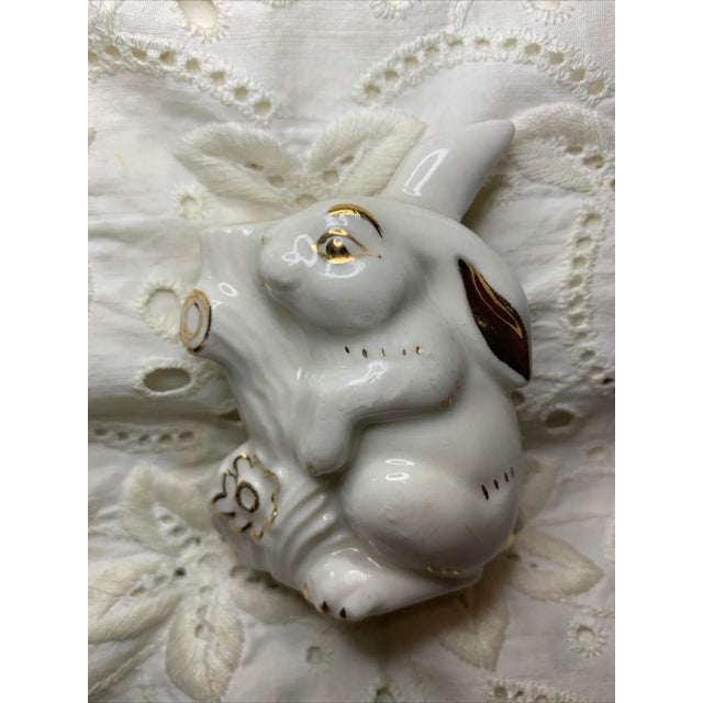 Vintage White Porcelain Bunny Rabbit With Tree Figurine w Gold Accents. In very nice vintage condition. Please see photos...