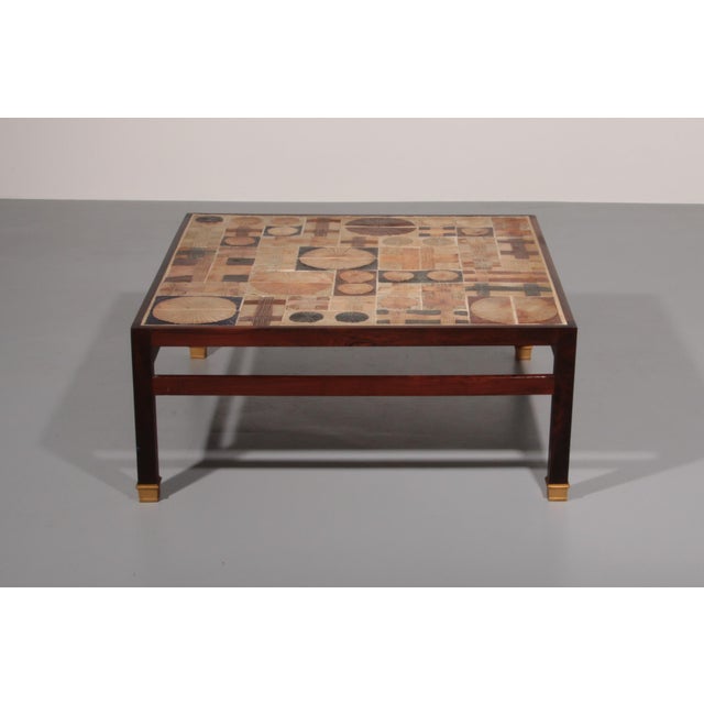 A striking example of Danish Modern craftsmanship, this rare coffee table was designed by the renowned duo Tue Poulsen and...
