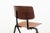 Model S17 by Galvanitas. The chair comes with a brown wooden seating and backpiece on a black metal frame. I have official...