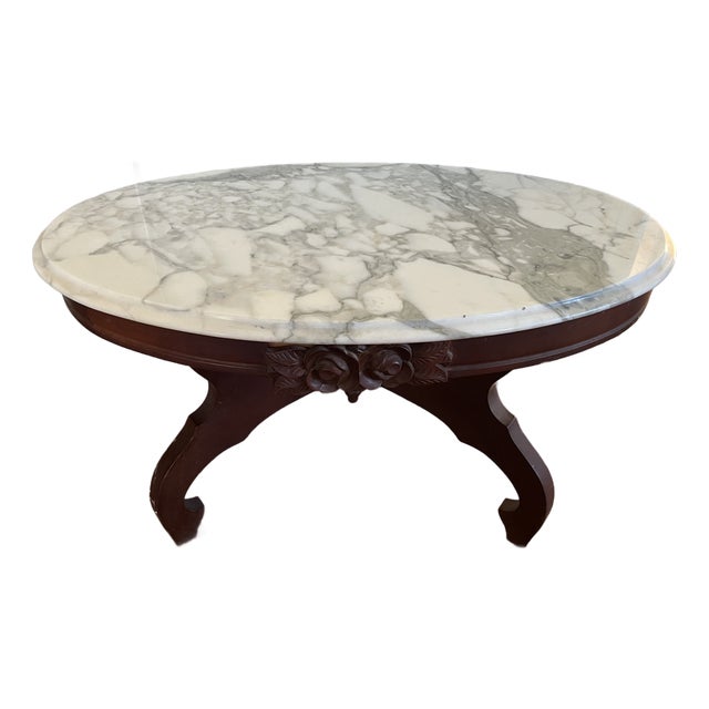 Mid 20th Century French Provincial Style Oval Marble-Top Coffee Table | Italian Marble | Carved Rose Appliqué | X-Stretcher Base For Sale