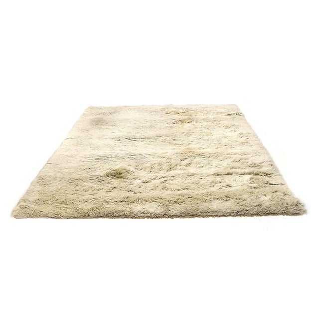 Large Sardinian-Made Rug Produced in the 1970s. Rectanguular rug with long pile texture in natural Sardinian Wool....