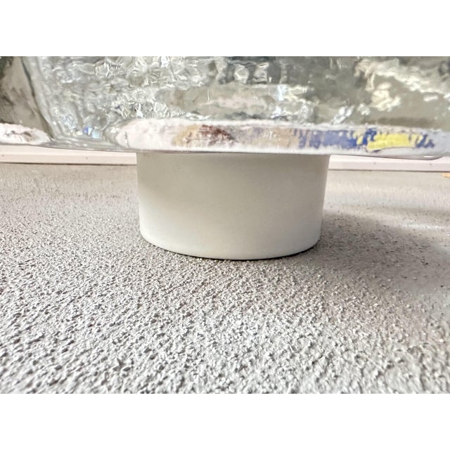 Beautiful mid-century design. A pair of 1970s wall lamps made by the German company Heinz Neuhaus Leuchten. Beautiful,...