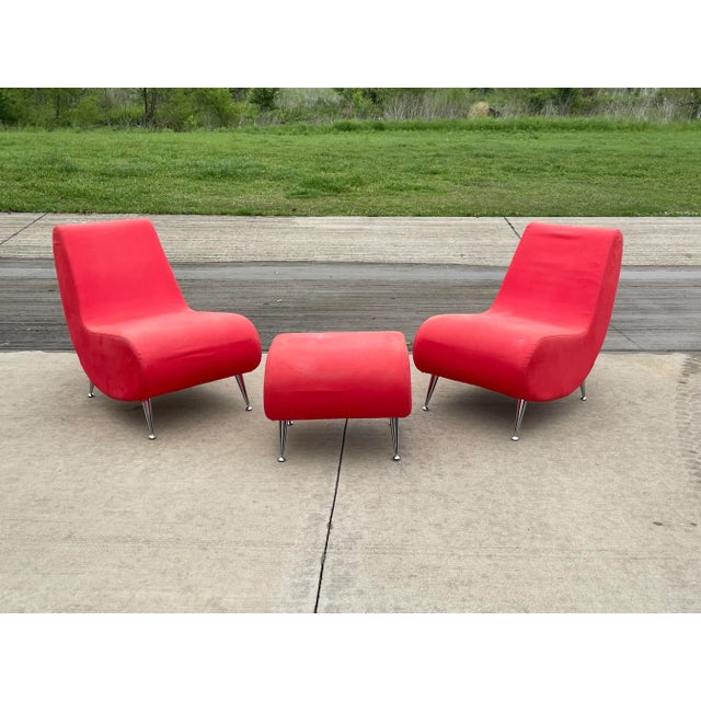 Fun and playful scoop lounge chairs with matching ottoman and chrome legs. Ottoman 20”W 18”D 16.5”H