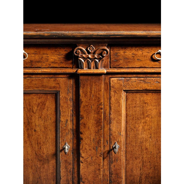 Hand crafted in Italy from solid walnut, this Rustic Tuscan sideboard is a striking example of classic craftsmanship and...