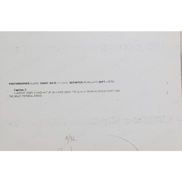 1991 black and white photograph from the bank of the Cooper River under the old Cooper Rivers Bridges. Publication...