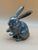 Charming vintage silver-tone rabbit sculpture featuring wonderfully expressive details, dramatically elongated ears, and...